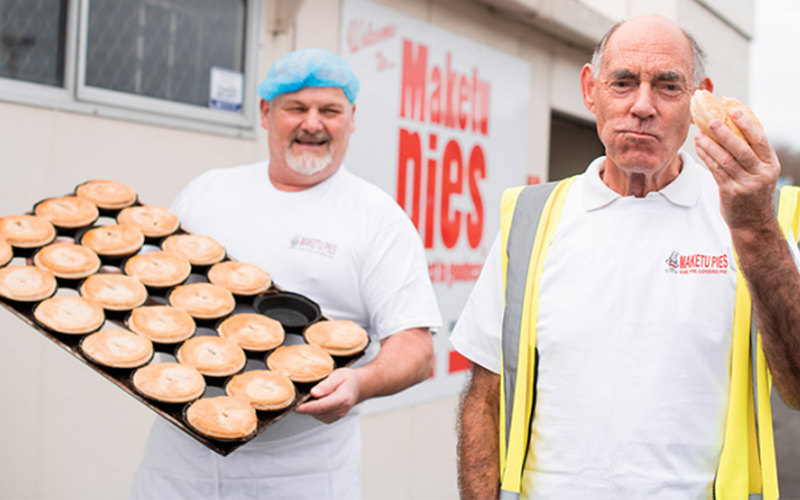 Ivan and Steve from Maketu Pies pose with some yummy pies