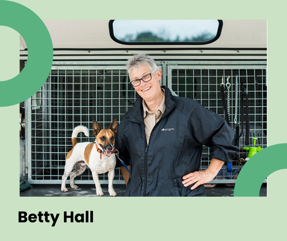 Western Bay staff member Betty Hall posing in front of a work ute.