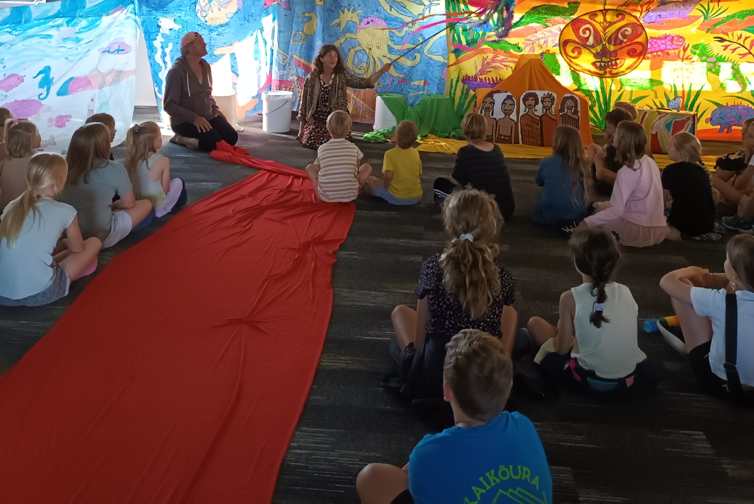 It's party time at Katikati Library, where the tamariki celebrate completing the Bob Squad summer reading program with a show from the Travelling Tuataras.